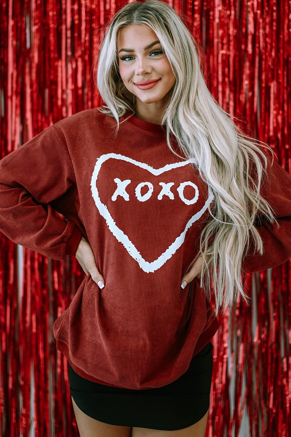 valentines day sweatshirt with XOXO and heart written on it