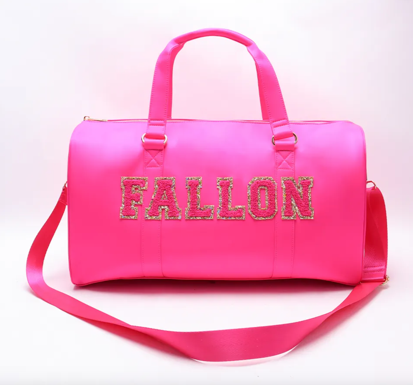 Personalized nylon duffle bag with patches in hot pink