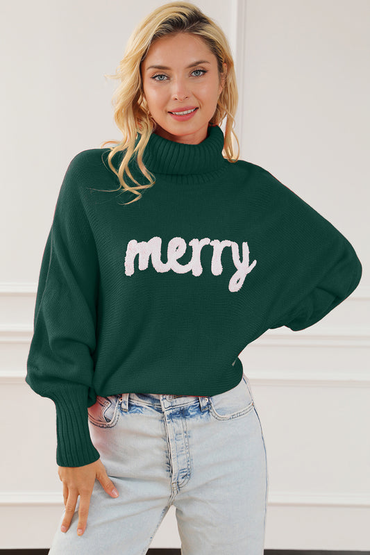 green turtleneck sweater with merry in white cursive letters embroidered for christmas holiday